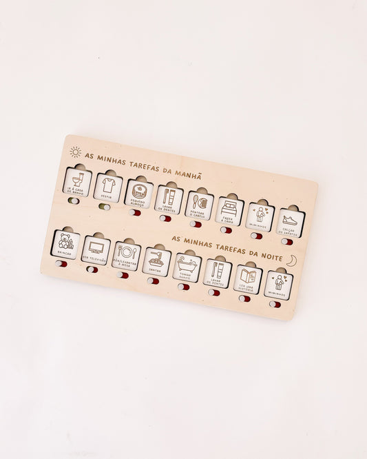 Quadro infantil com botão deslizante que revela a cor verde após conclusão da tarefa.