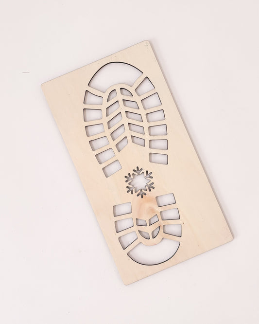 Molde lateral da pegada do Pai Natal, ideal para criar marcas mágicas no chão.