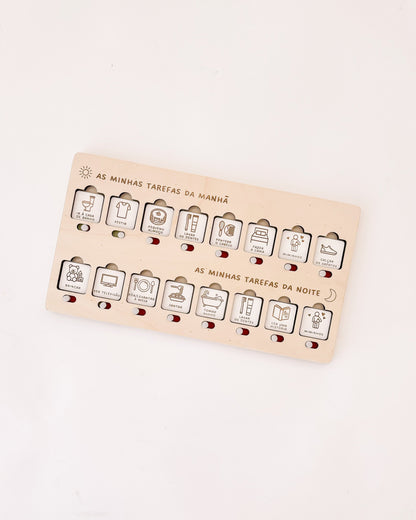 Quadro infantil com botão deslizante que revela a cor verde após conclusão da tarefa.